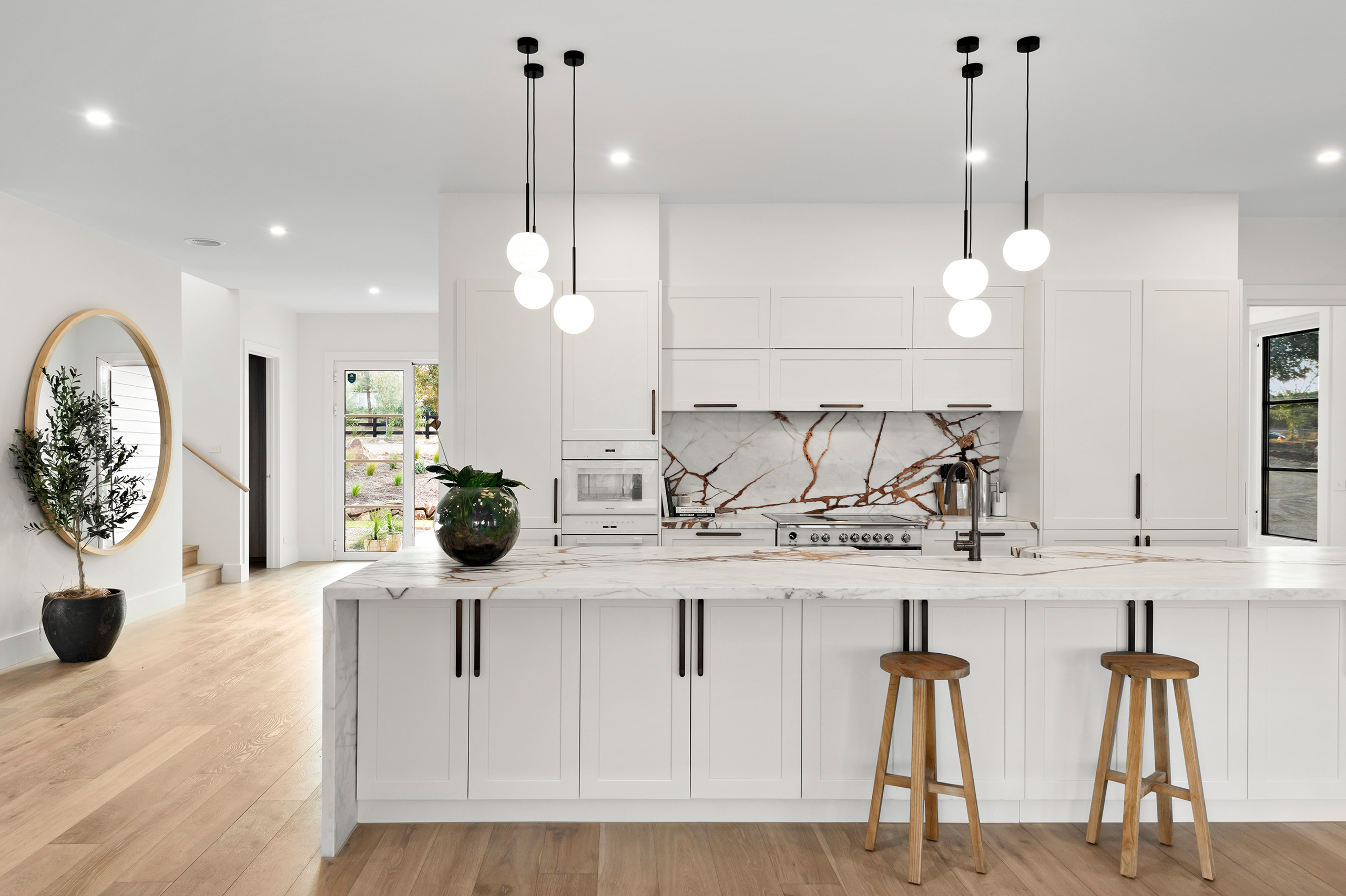Modern architectural Hamptons kitchen, marble benchtops, shaker style cabinetry