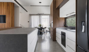Contemporary, industrial chic kitchen with custom cabinetry.