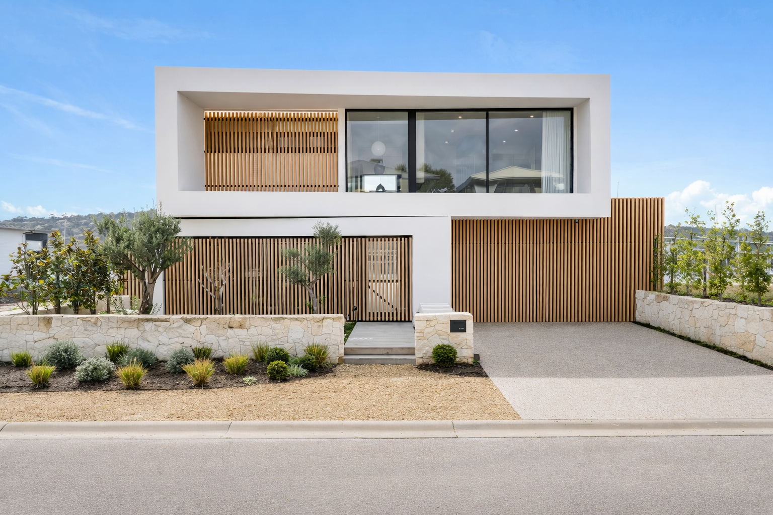 Modern architectural Martha Cove residence, backing onto the picturesque marina. Beautifully framed by aluminium battens, providing security, privacy and elegant vertical lines.