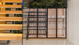 Custom, under staircase glass wine cabinets